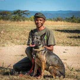 A local ranger and his tracking dog, Fenix
