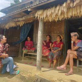 Prakash Gandharva performing songs about wildlife regulations and the risks of participating in illegal trade in Padampur, Chitwan, Nepal. Credit: Kumar Paudel/Greenhood Nepal