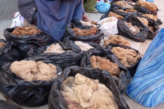 Baskets of illegal Vicuna fibre being sold at a market.
